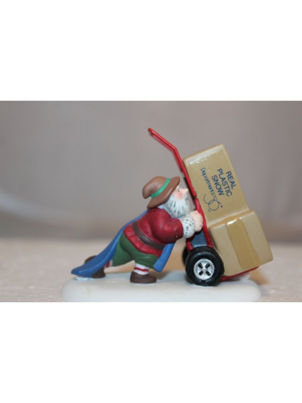 Dept 56 North Pole Village - Delivering the Real Plastic Snow (no box)